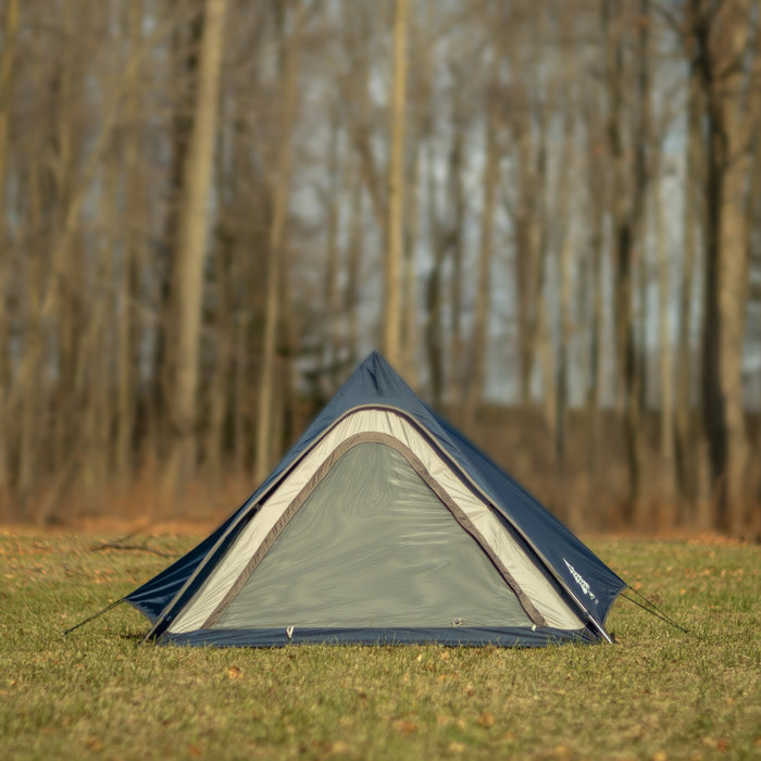 Front view of the Woods A-frame 3-person 3-season tent in Blue on grass
