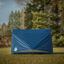 Load image into Gallery viewer, Side view of the Woods A-frame 3-person 3-season tent in Blue on grass