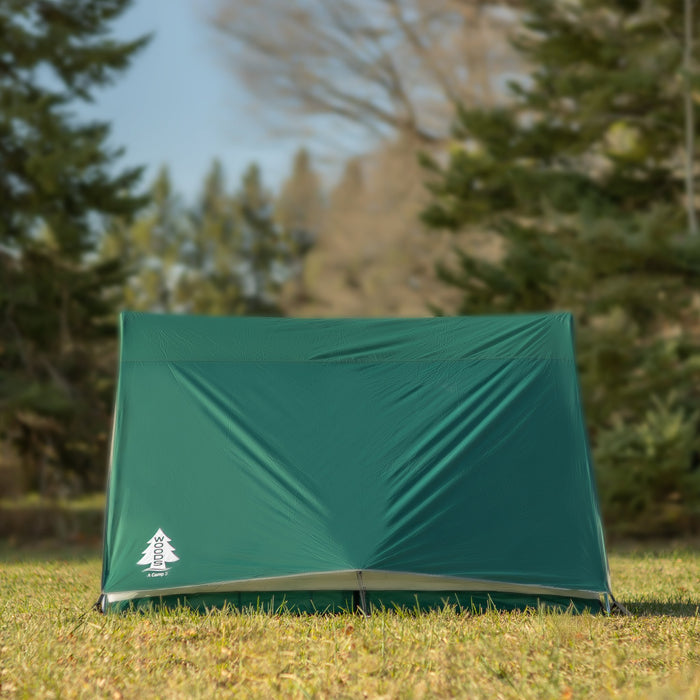 Side view of the Woods A-Frame 3-Person 3-Season Tent in Green on campground