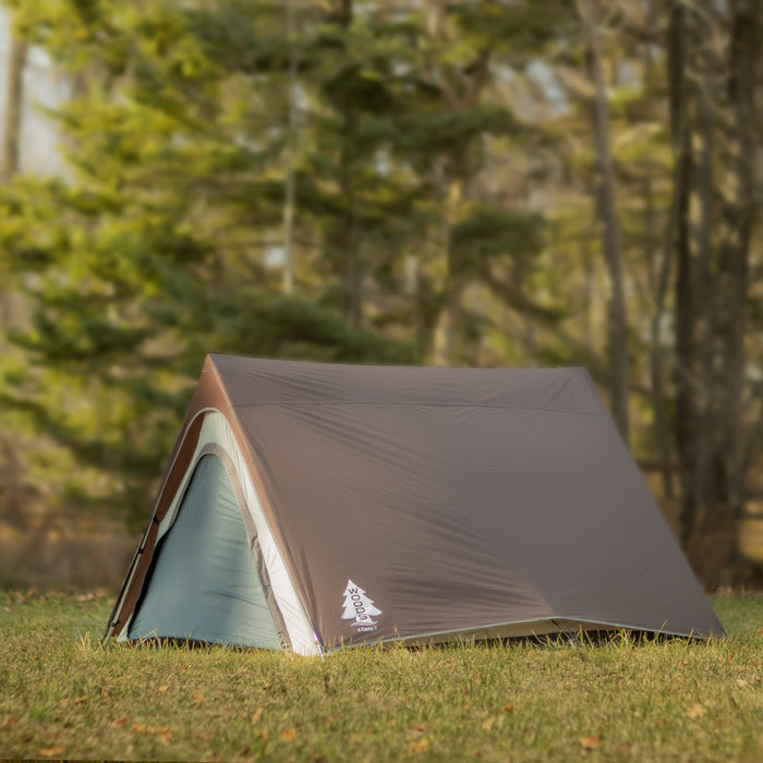 Fully built Woods A-Frame 3-Person 3-Season Tent in Brown angled left on a campground