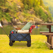 Load image into Gallery viewer, Woods Outdoor Collapsible Utility King Wagon in Navy full of gear on campground