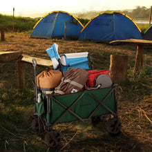 Load image into Gallery viewer, Woods Outdoor Collapsible Utility King Wagon in Green filled with gear on campground