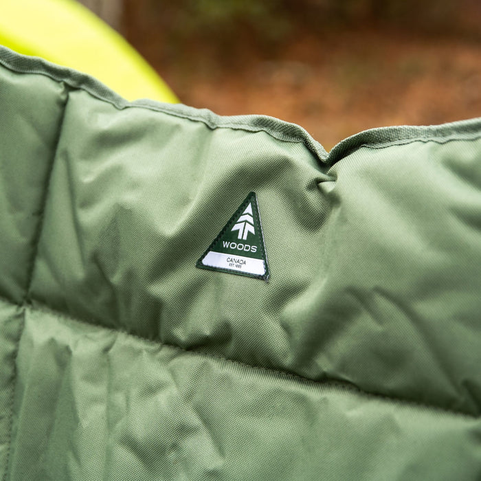 Close up of the padding and logo on the Woods Ashcroft Camping Lounger Chair in Sea Spray
