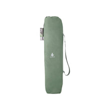 Load image into Gallery viewer, Woods Ashcroft 3-Position Camping Lounger Chair in Sea Spray inside the carry bag