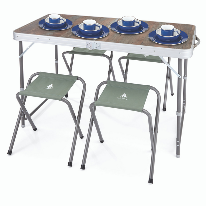 Four sets of cookware on top of a fully set up Woods Folding Portable Camping Table Set with Four Camping Chairs