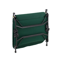 Load image into Gallery viewer, Folded up Woods Portable Quick Set-Up Adjustable 2-in-1 Camping Lounger in Green on an angle