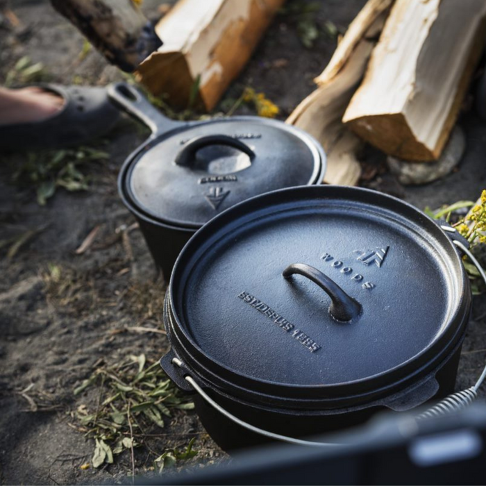 Close up of the pot and Dutch oven with lids on campground