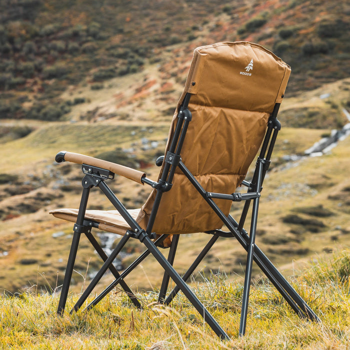 Behind view of the Woods Siesta Folding Reclining Padded Camping Chair in Dijon on grass